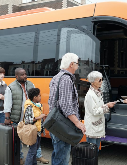 young-bus-conductor-checking-tickets-by-open-door-of-vehicle.jpg young-bus-conductor-checking-tickets-by-open-door-of-vehicle.jpg